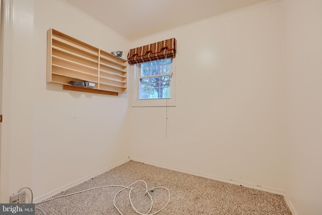 unfurnished room featuring carpet flooring, baseboards, and ornamental molding