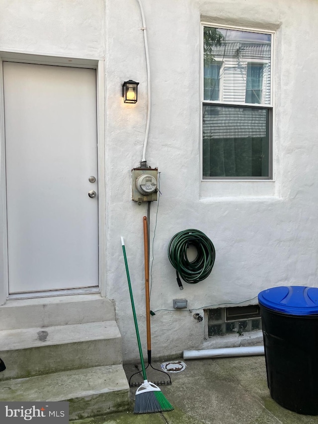 2147 W Grange Ave, Philadelphia, PA 19138 - doorway to property with stucco siding