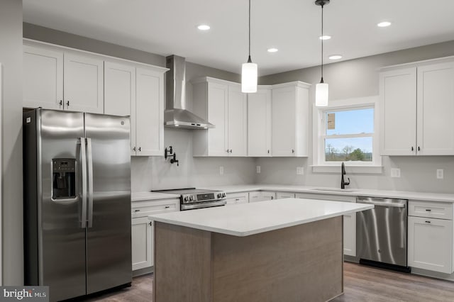 309 Gun Club Rd, Stephenson, VA 22656 - kitchen with wall chimney exhaust hood, a sink, light countertops, appliances with stainless steel finishes, and white cabinetry
