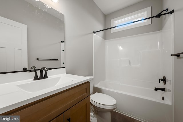 309 Gun Club Rd, Stephenson, VA 22656 - bathroom with toilet, wood finished floors, vanity, and  shower combination