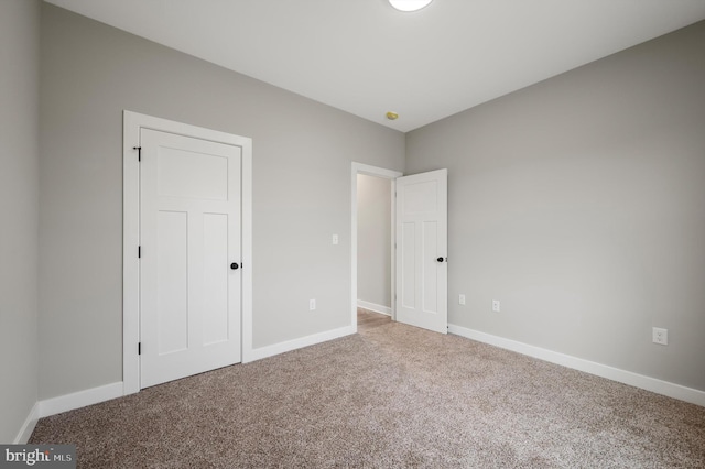 309 Gun Club Rd, Stephenson, VA 22656 - unfurnished bedroom featuring carpet flooring and baseboards