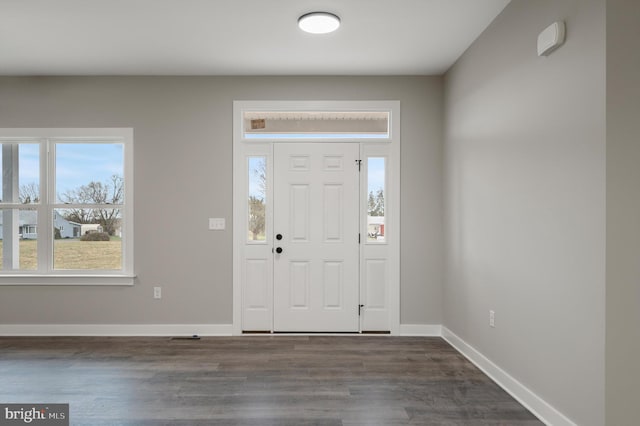 309 Gun Club Rd, Stephenson, VA 22656 - foyer with dark wood-style flooring and baseboards