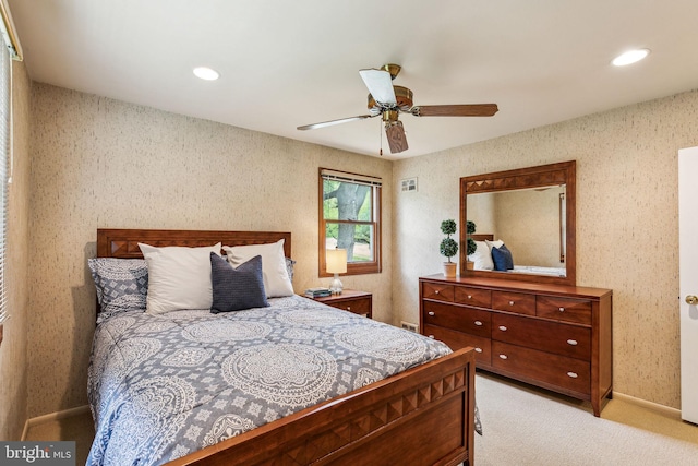 bedroom with a ceiling fan, recessed lighting, baseboards, visible vents, and light carpet