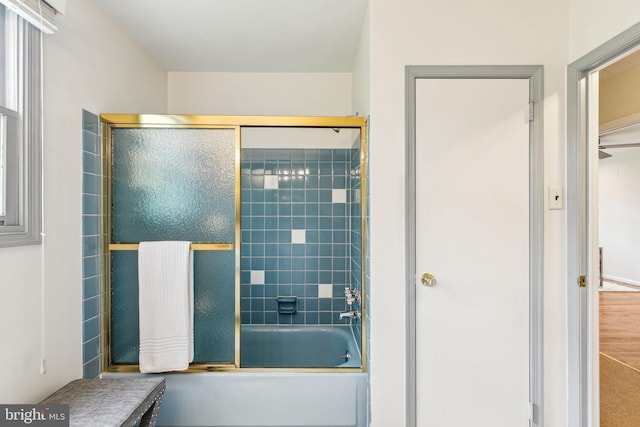 full bathroom featuring enclosed tub / shower combo