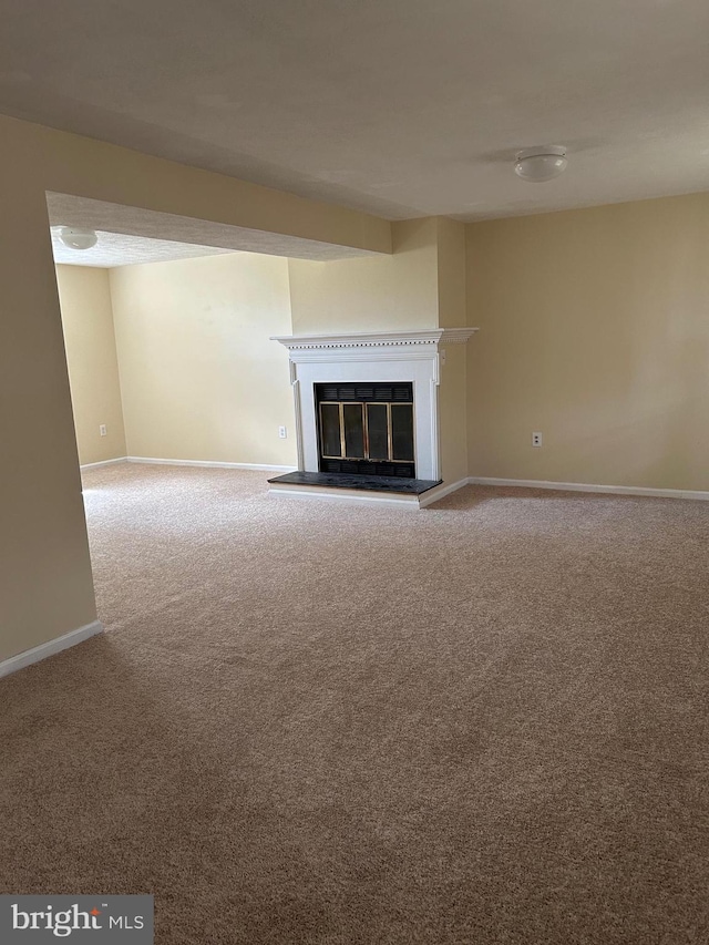 4913 Odell Rd, Beltsville, MD 20705 - unfurnished living room with a glass covered fireplace, carpet, and baseboards