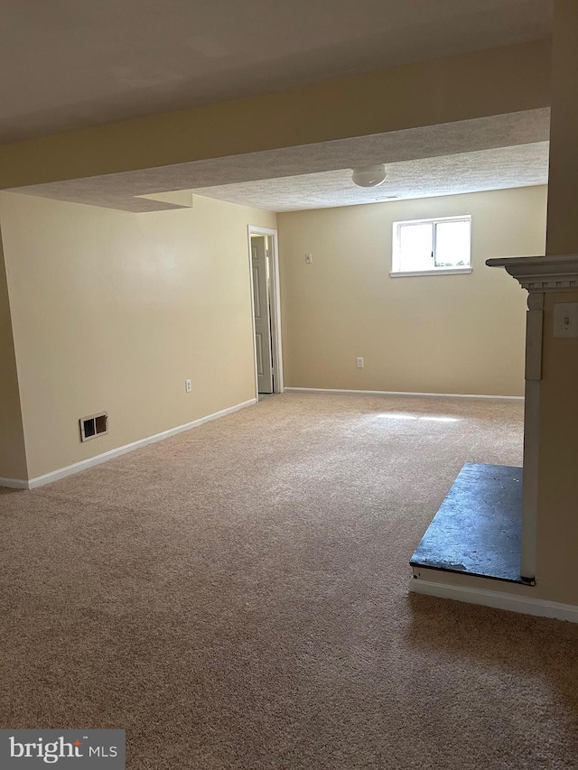4913 Odell Rd, Beltsville, MD 20705 - below grade area with visible vents, baseboards, and carpet flooring