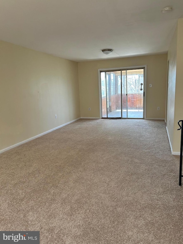 4913 Odell Rd, Beltsville, MD 20705 - empty room with carpet flooring and baseboards