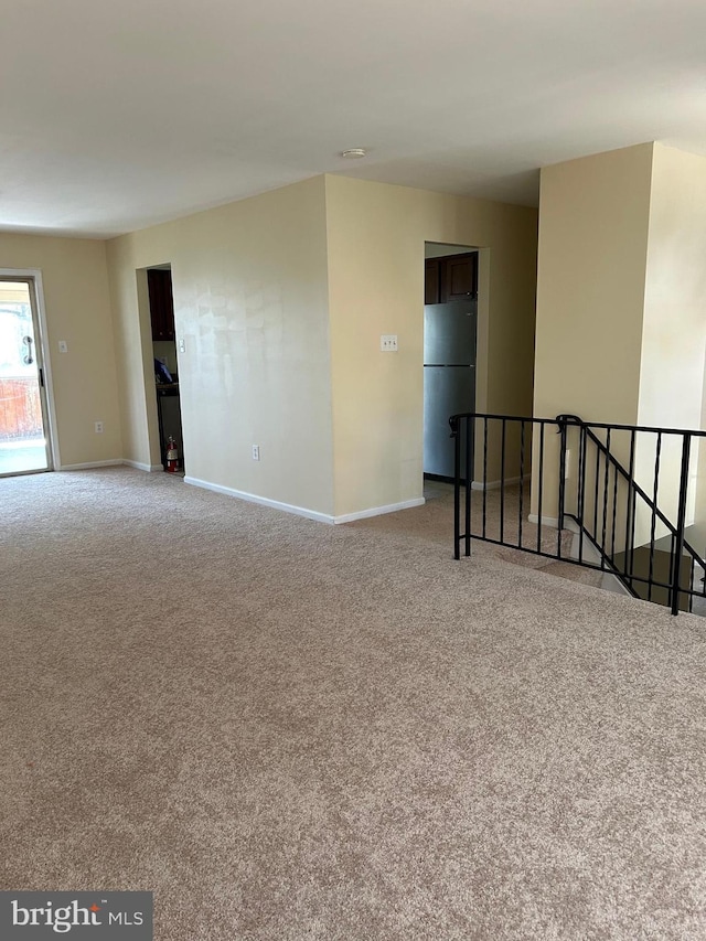 4913 Odell Rd, Beltsville, MD 20705 - carpeted empty room with baseboards