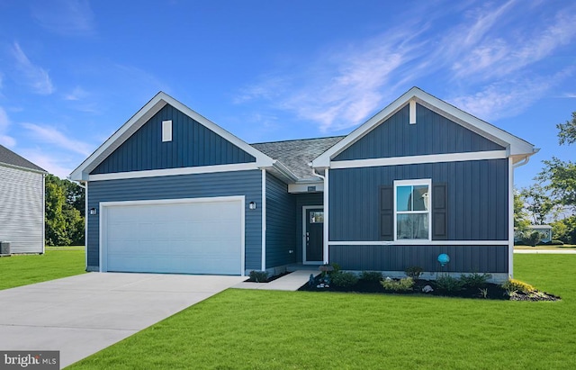 38580 Ketch Dr, Selbyville, DE 19975 - view of front facade featuring a garage, a front yard, and concrete driveway
