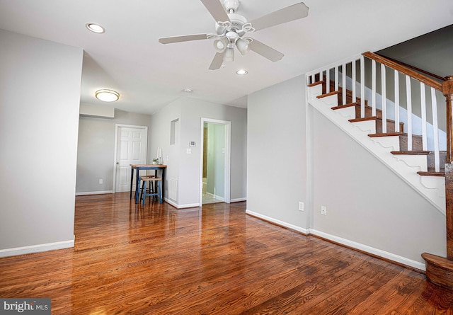 unfurnished living room with baseboards, recessed lighting, stairs, ceiling fan, and wood finished floors