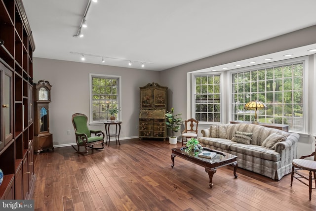 21 Robin Rd, Moorestown, NJ 08057 - living area featuring track lighting, dark wood-style floors, and baseboards