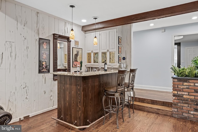21 Robin Rd, Moorestown, NJ 08057 - indoor wet bar with baseboards, wood finished floors, hanging light fixtures, wood walls, and recessed lighting