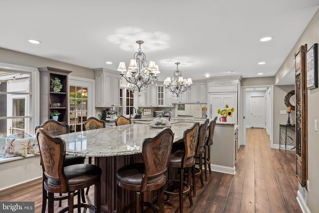 21 Robin Rd, Moorestown, NJ 08057 - dining area featuring a chandelier, dark wood-style flooring, recessed lighting, and baseboards