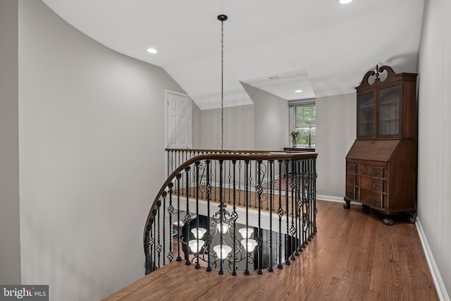 21 Robin Rd, Moorestown, NJ 08057 - stairs featuring a chandelier, wood finished floors, baseboards, recessed lighting, and lofted ceiling