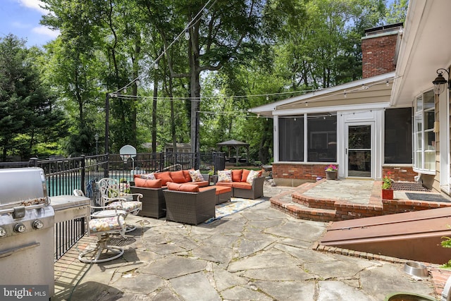 21 Robin Rd, Moorestown, NJ 08057 - view of patio / terrace featuring a sunroom, an outdoor living space, and view of wooded area