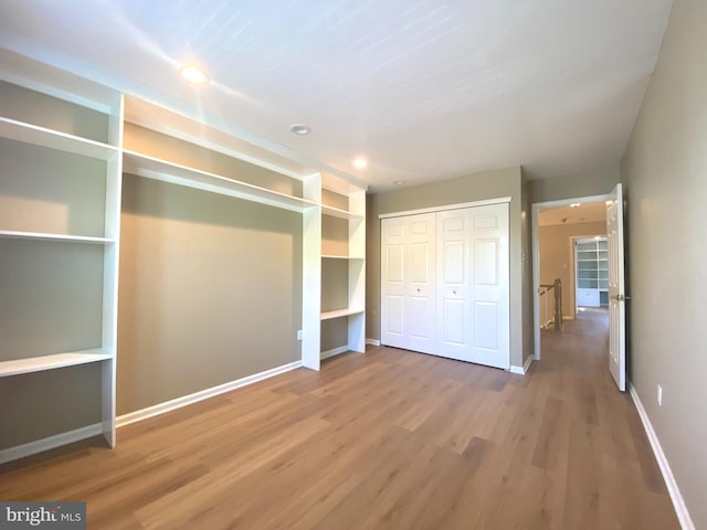 97 Kirkwood Dr, Newtown, PA 18940 - unfurnished bedroom with recessed lighting, wood finished floors, a closet, and baseboards