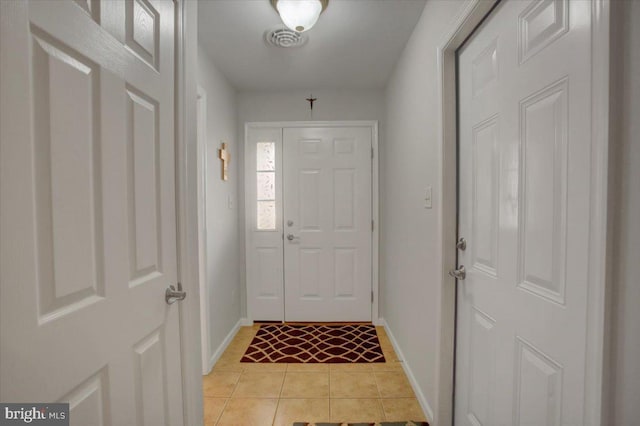 226 Matthew Dr, Chambersburg, PA 17201 - doorway with light tile patterned floors, visible vents, and baseboards