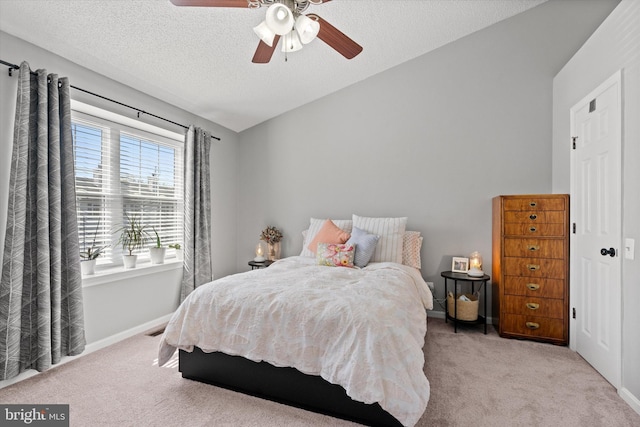 11200 Rienzi Pl Unit 201, Manassas, VA 20109 - bedroom featuring a ceiling fan, visible vents, carpet, and a textured ceiling