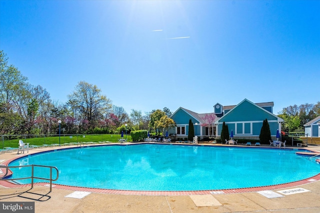 11200 Rienzi Pl Unit 201, Manassas, VA 20109 - community pool featuring a patio area