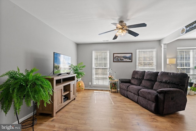11200 Rienzi Pl Unit 201, Manassas, VA 20109 - living area with light wood finished floors, visible vents, and a ceiling fan