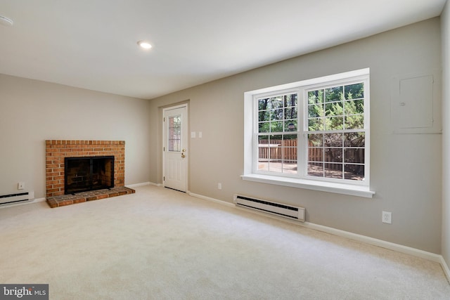 unfurnished living room with baseboards, a baseboard radiator, and carpet floors