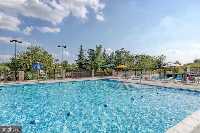 pool featuring fence
