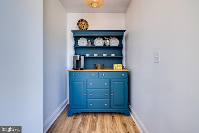 901 Riverside Ave, Grottoes, VA 24441 - bar with light wood-style flooring and baseboards