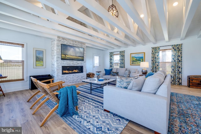 901 Riverside Ave, Grottoes, VA 24441 - living room with a fireplace, plenty of natural light, baseboards, and beam ceiling