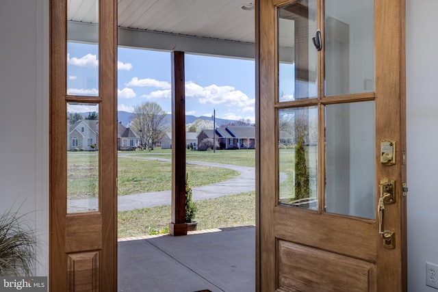 901 Riverside Ave, Grottoes, VA 24441 - doorway with concrete floors, a mountain view, and a residential view
