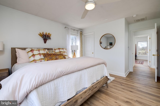 901 Riverside Ave, Grottoes, VA 24441 - bedroom featuring light wood-style flooring, baseboards, a ceiling fan, and visible vents
