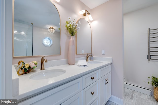 901 Riverside Ave, Grottoes, VA 24441 - bathroom featuring baseboards, double vanity, a baseboard radiator, and a sink