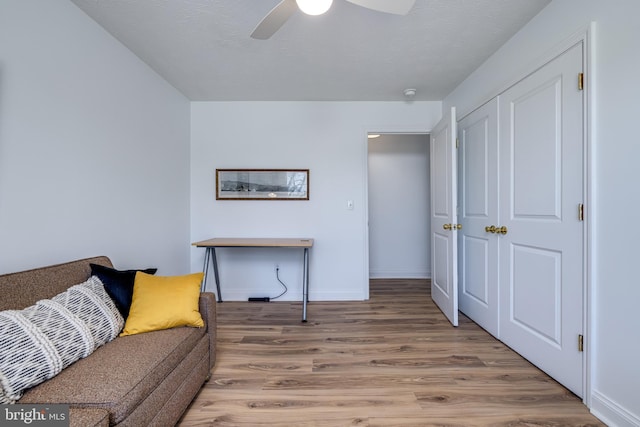 901 Riverside Ave, Grottoes, VA 24441 - living area with baseboards, a ceiling fan, and wood finished floors