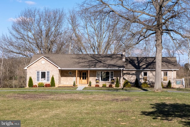 901 Riverside Ave, Grottoes, VA 24441 - ranch-style home featuring roof with shingles, brick siding, a front lawn, and covered porch
