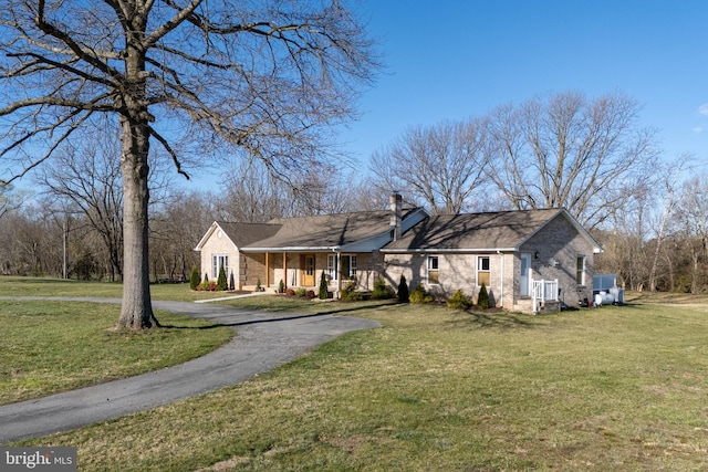 901 Riverside Ave, Grottoes, VA 24441 - view of front of property featuring a front yard and aphalt driveway