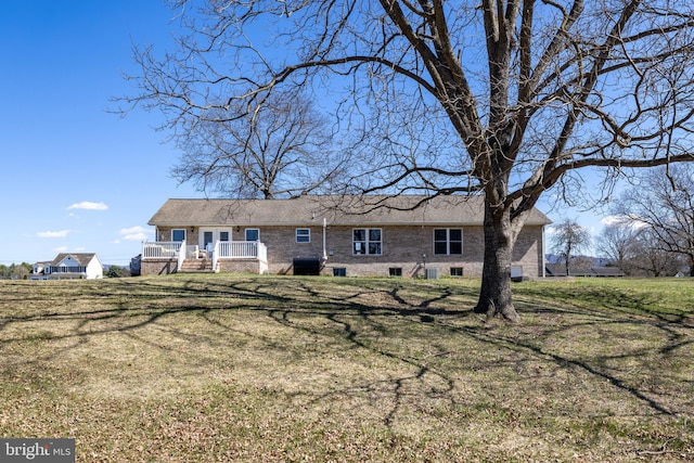 901 Riverside Ave, Grottoes, VA 24441 - rear view of house with a yard, central AC unit, and a deck