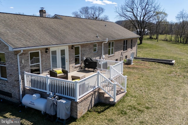 901 Riverside Ave, Grottoes, VA 24441 - back of property featuring an outdoor hangout area, a wooden deck, a lawn, a chimney, and a shingled roof