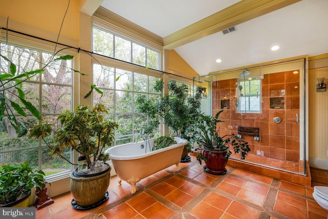 2709 Mckinley St NW, Washington, DC 20015 - bathroom with visible vents, a freestanding tub, a shower stall, tile patterned flooring, and lofted ceiling