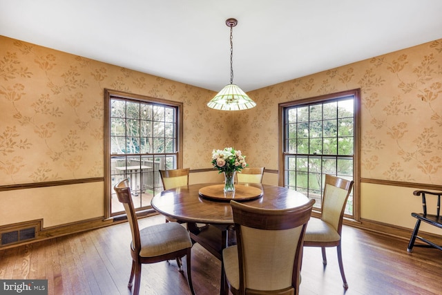 2709 Mckinley St NW, Washington, DC 20015 - dining area with baseboards, wood-type flooring, and visible vents
