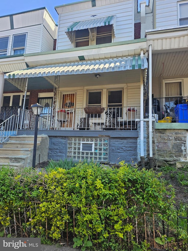 5238 Pennsgrove St, Philadelphia, PA 19131 - back of house featuring covered porch