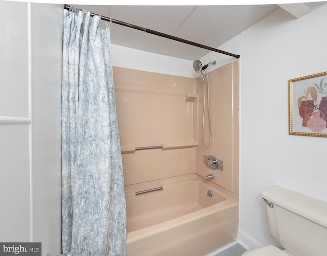 bathroom with shower / tub combo with curtain and toilet