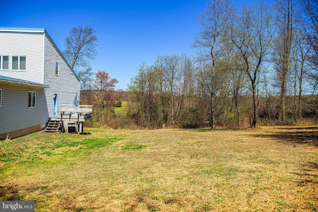 view of yard with a deck