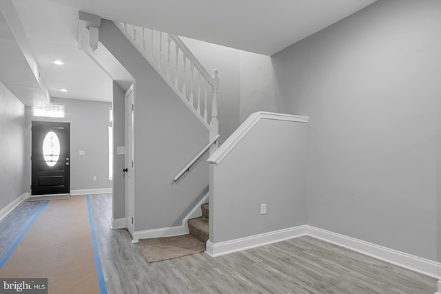 3417 Edmondson Ave, Baltimore, MD 21229 - foyer entrance with stairway, baseboards, wood finished floors, and recessed lighting