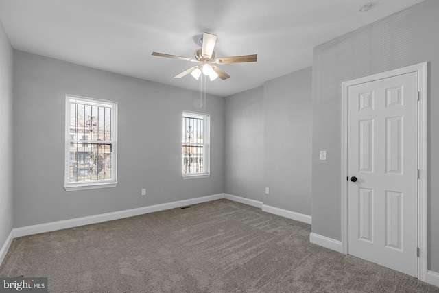 3417 Edmondson Ave, Baltimore, MD 21229 - unfurnished room featuring plenty of natural light, a ceiling fan, and carpet flooring