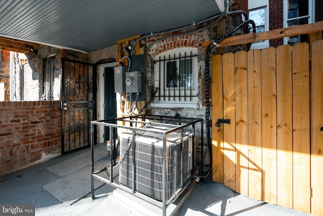 3417 Edmondson Ave, Baltimore, MD 21229 - exterior space with a gate, central AC unit, and fence