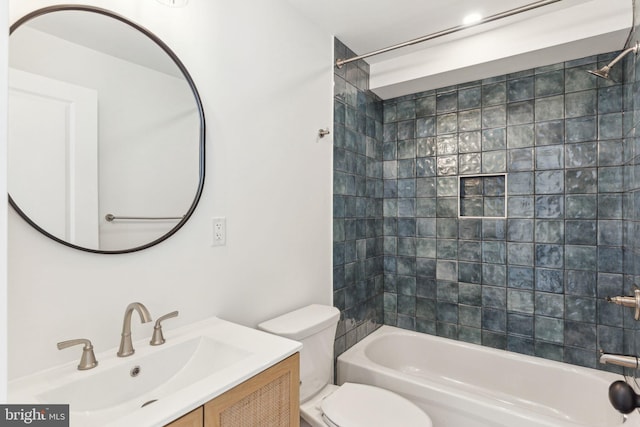 bathroom with toilet, bathtub / shower combination, and vanity