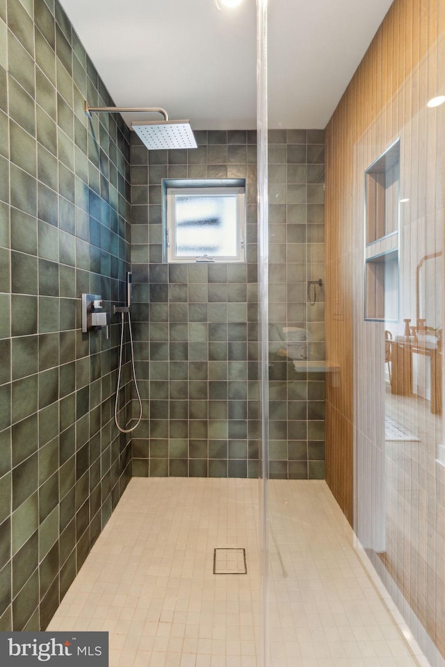 full bath featuring a shower stall