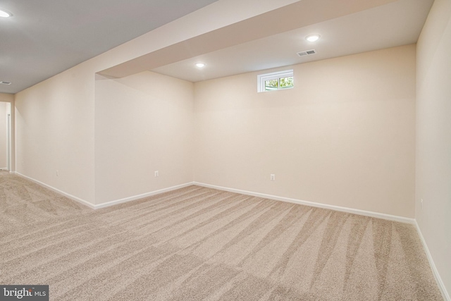 basement with recessed lighting, baseboards, visible vents, and carpet floors