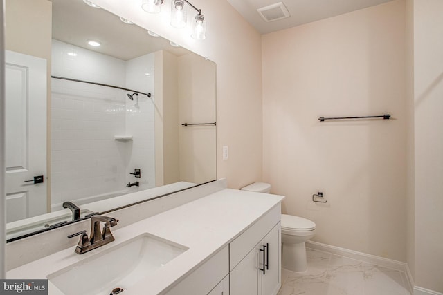 bathroom featuring vanity, baseboards, toilet, visible vents, and marble finish floor