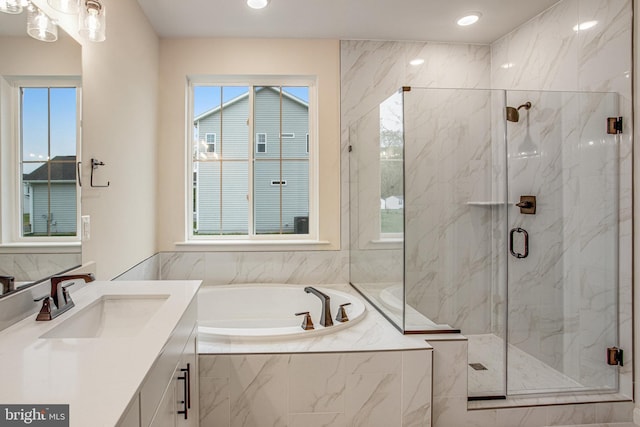 full bathroom with a bath, a marble finish shower, vanity, and recessed lighting