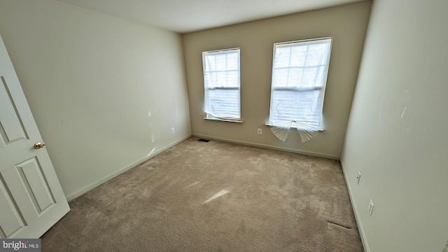 5502 Frankford Estates Dr, Baltimore, MD 21206 - carpeted empty room with baseboards